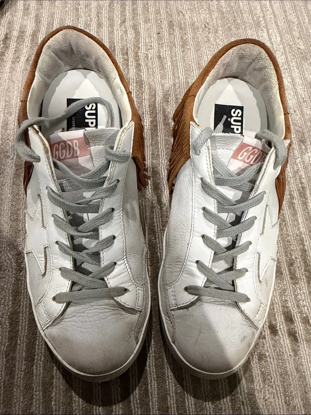 Golden Goose Women’s White Nubuck Low Top Super Star with Brown suede fringe.